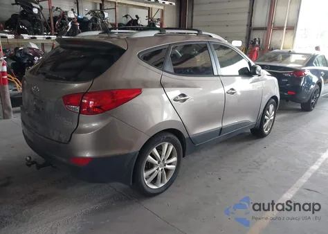 2012 Hyundai Tucson Limited from USA, damaged, VIN KM8JUCAC7CU381972